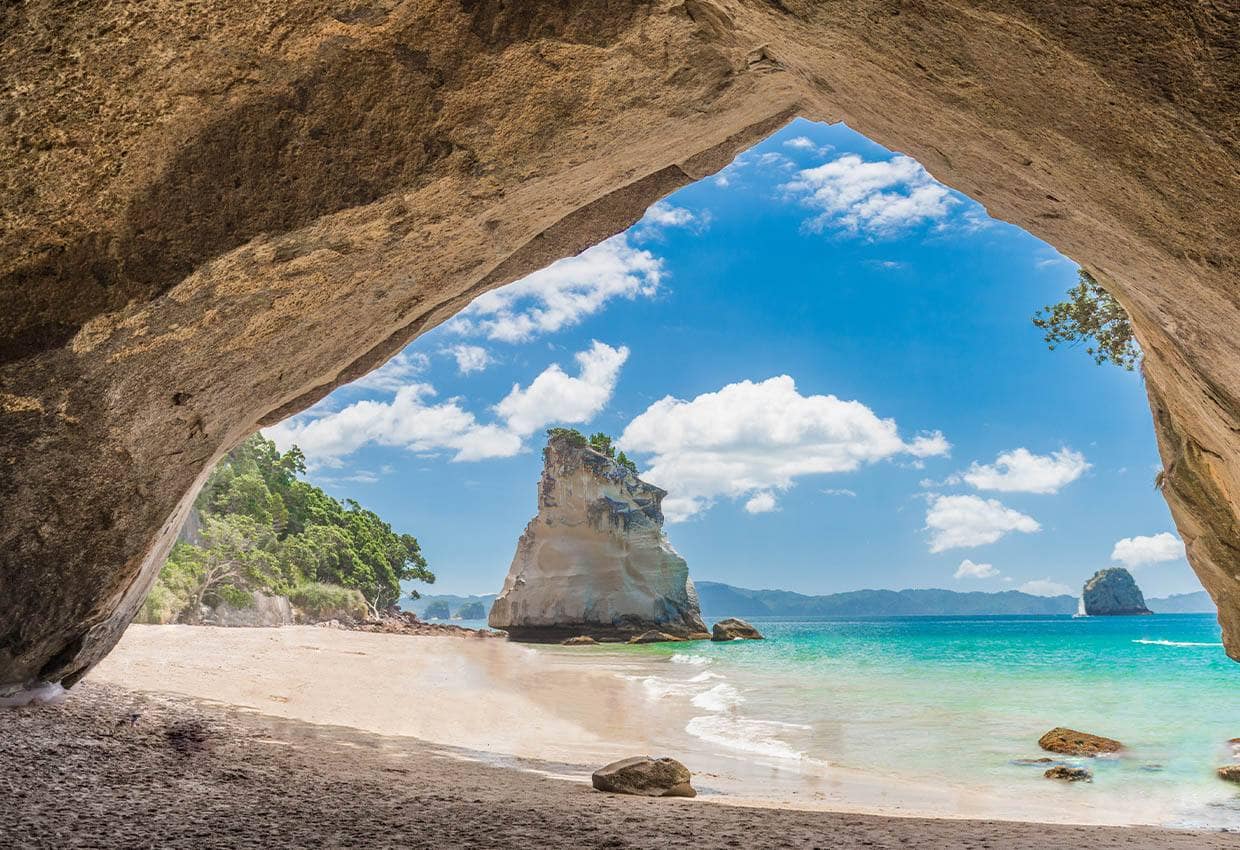 A sea cave opening onto a New Zealand beach