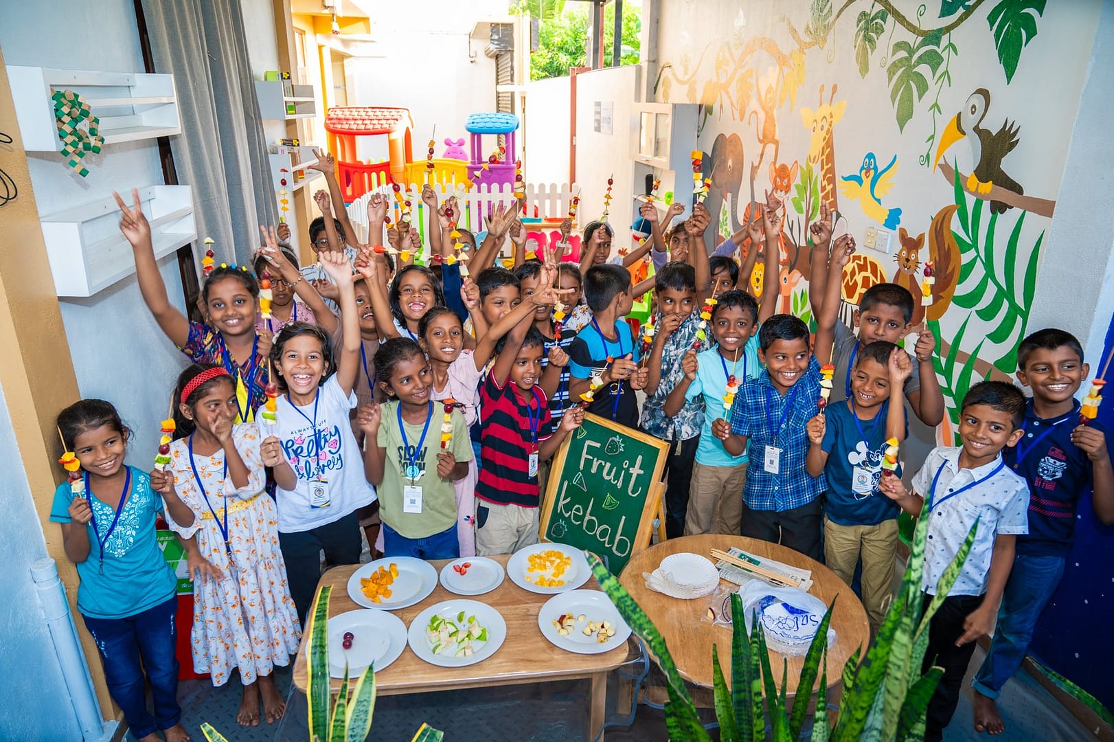 Kindergarten volunteer with local children near Galle Sri Lanka
