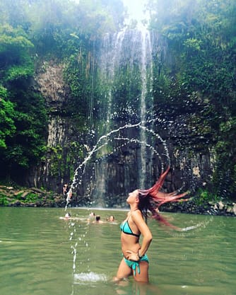 Do the 'hair flick' at Millaa Millaa falls in the Atherton Tablelands